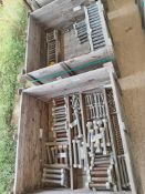 LOT OF (1282) PIECES OF STUDS AND PIPE CONNECTIONS