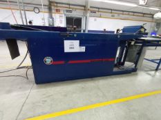 T-SHIRT FOLDING MACHINE