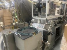 KHS/Bartelt Vertical Pouch Machine With Talon Mfg., Inc. Hooded Slider Attachment
