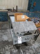 Two carts and Cat 50 tool holders with some tooling