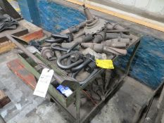 Crate of Cat 50 tool holders with tooling, swivel lifting bolts