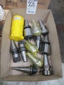 Twelve Cat 40 tool holders