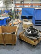 Three skids of belts, two skids of hose, hoist, drive shaft, flow units etc.