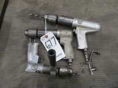 Three pneumatic drills