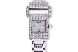 A PIAGET LADIES WHITE GOLD AND DIAMOND BRACELET WATCH