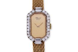 A CHOPARD LADIES GOLD AND DIAMOND COCKTAIL WATCH
