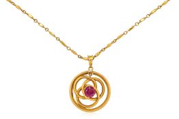 A GOLD PENDANT ON CHAIN