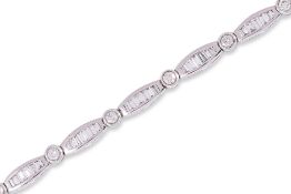 A DIAMOND AND WHITE GOLD BRACELET