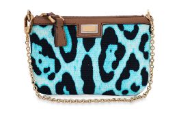 A DOLCE & GABBANA WRISTLET BAG IN BLUE LEOPARD PRINT