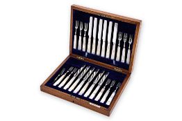 A SET OF VICTORIAN MOTHER OF PEARL FRUIT KNIVES AND FORKS