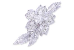 A DIAMOND FLORAL BROOCH