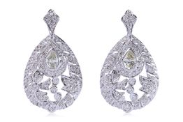 A PAIR OF DIAMOND EARRINGS