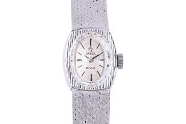 AN OMEGA LADIES' BRACELET WATCH