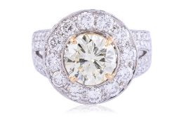 A LIGHT YELLOW DIAMOND RING