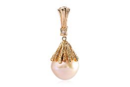 A GOLDEN SOUTH SEA CULTURED PEARL PENDANT BY TASAKI