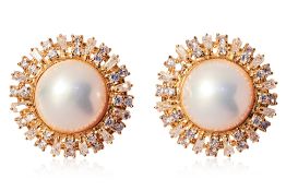 A PAIR OF MABE CULTURED PEARL AND DIAMOND STUD EARRINGS