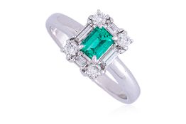AN EMERALD AND DIAMOND RING