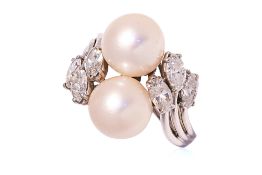 AN AKOYA CULTURED PEARL AND DIAMOND RING
