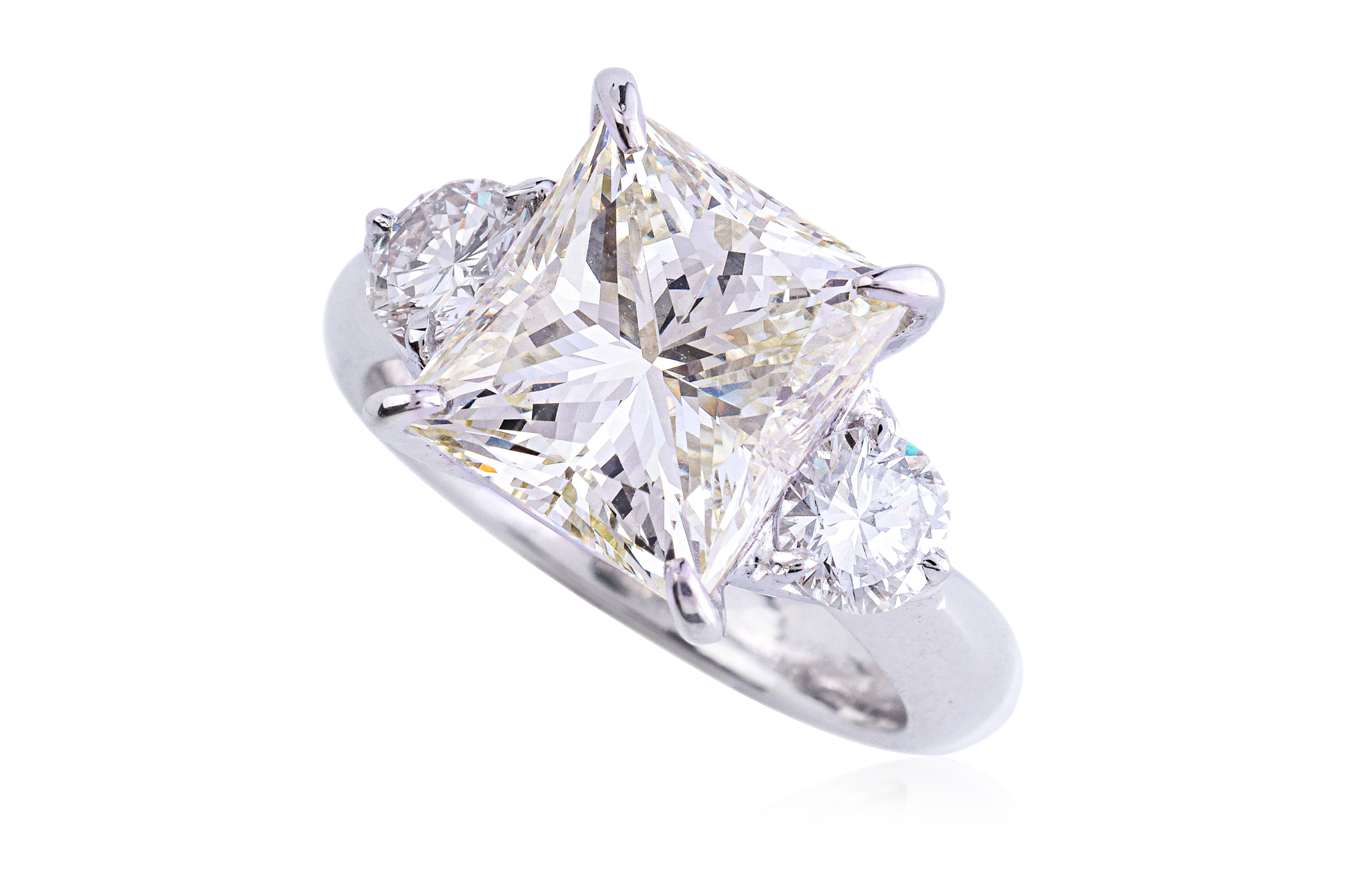 A LARGE DIAMOND THREE STONE RING
