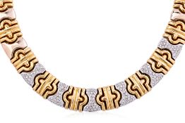 A LARGE TWO TONE DIAMOND ARTICULATED CHOKER