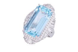 A LARGE AQUAMARINE AND DIAMOND RING