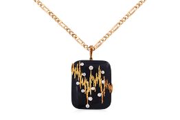 A ONYX AND DIAMOND PENDANT ON CHAIN BY UNOAERRE