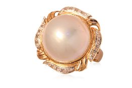 A MABE CULTURED PEARL AND DIAMOND RING