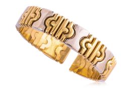 A TWO TONE GOLD CUFF BANGLE