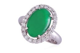 A TYPE A JADEITE AND DIAMOND 'HALO' RING