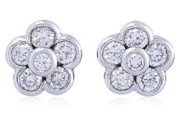 A PAIR OF DIAMOND 'FLOWER' STUD EARRINGS