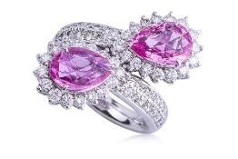 A PINK SAPPHIRE AND DIAMOND RING