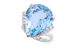 A LARGE AQUAMARINE AND DIAMOND RING