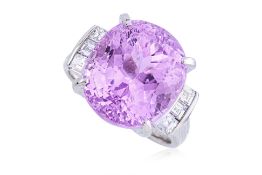 A LARGE KUNZITE AND DIAMOND RING