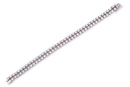 A DOUBLE STRAND DIAMOND TENNIS BRACELET