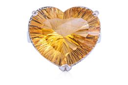 A LARGE CITRINE AND DIAMOND RING