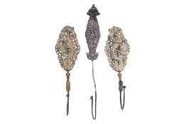 A GROUP OF THREE WEDDING BED CURTAIN HOOKS