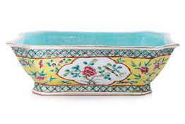 A FAMILLE ROSE YELLOW GROUND DISH