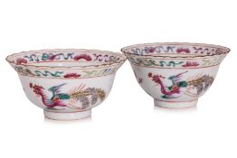 A PAIR OF FAMILLE ROSE PHOENIX AND PEONY BOWLS