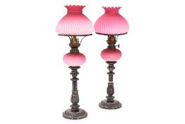 A PAIR OF PINK SATIN GLASS TABLE LAMPS