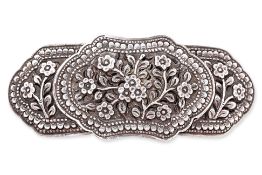A SILVER THREE PIECE BELT BUCKLE