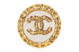 A CHANEL ROUND ORNATE CC BROOCH
