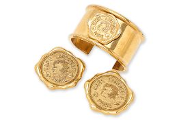 A KARL LAGERFELD MATCHING CUFF AND EARRINGS