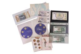 A GROUP OF MALAYSIA AND SINGAPORE BANKNOTES AND COINS