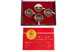 A CHINA 30TH ANNIVERSARY FOUR GOLD COIN SET