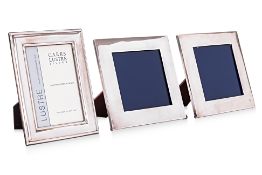 A GROUP OF THREE SILVER PHOTO FRAMES