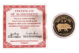 A SINGAPORE YEAR OF THE PIG 1983 $500 GOLD PROOF COIN