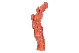 A LARGE CARVED RED CORAL FIGURE OF A LADY