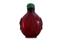 A TRANSPARENT RUBY-RED GLASS SNUFF BOTTLE