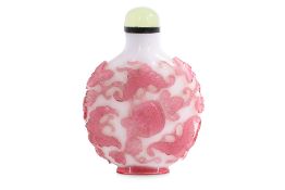 A WATERMELON-PINK OVERLAY OPAQUE WHITE 'BUTTERFLIES AND FLOWERS' SNUFF BOTTLE