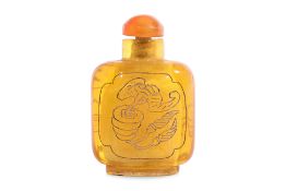 A TRANSPARENT AMBER GLASS SNUFF BOTTLE